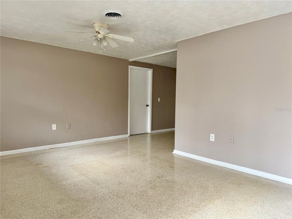 7441 Banner Street New Port Richey, FL 34653 - Photo 8 of 20 a view of an empty room with a window