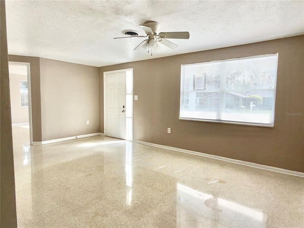 7441 Banner Street New Port Richey, FL 34653 - Photo 9 of 20 a view of an empty room with a window