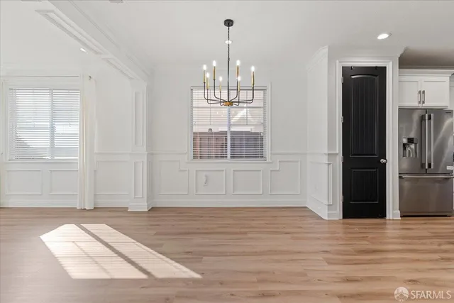 a view of a hallway with a window