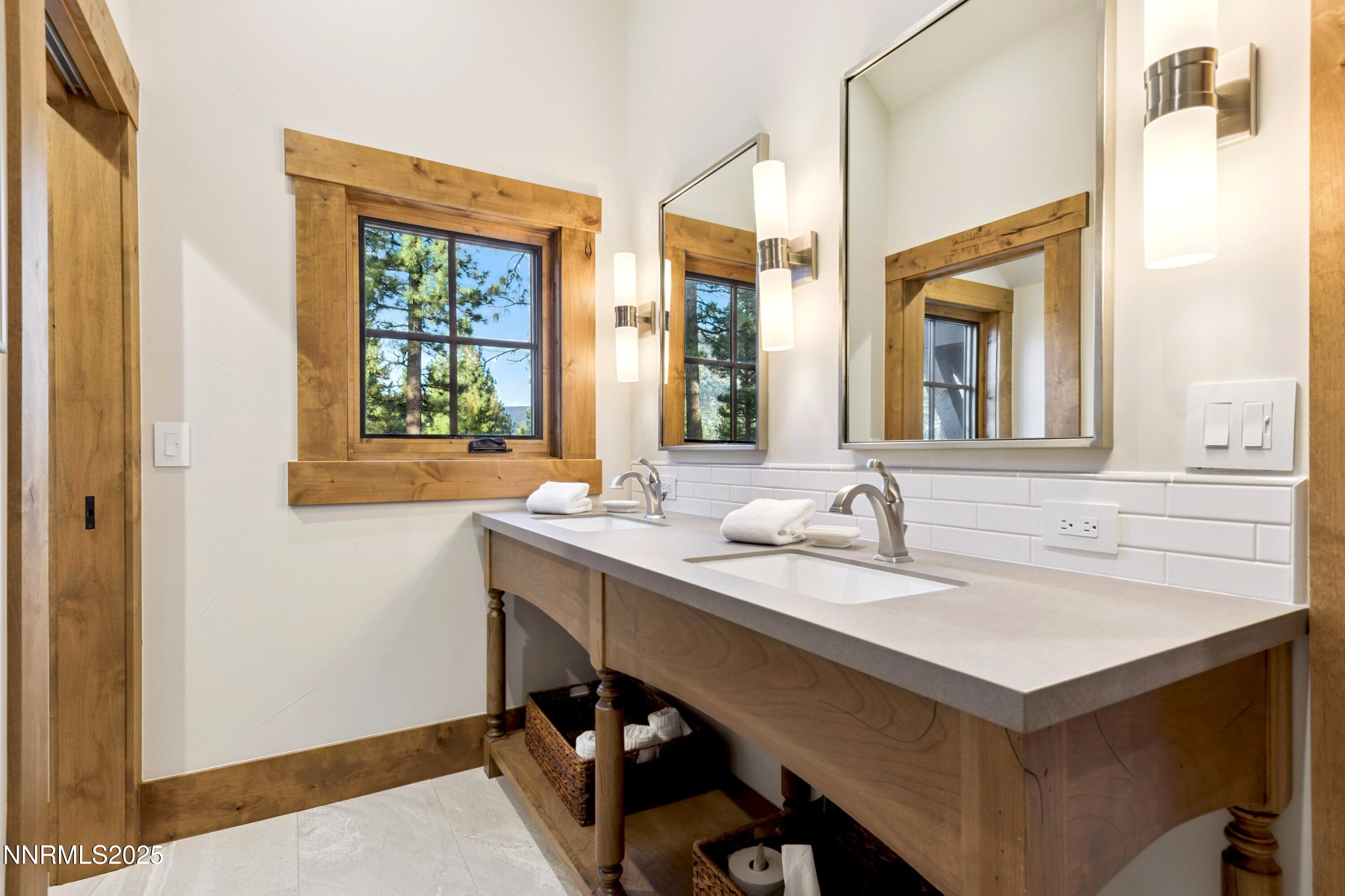 261 Redding Way Carson City, NV 89705 - Photo 47 of 90 a bathroom with a sink and a window