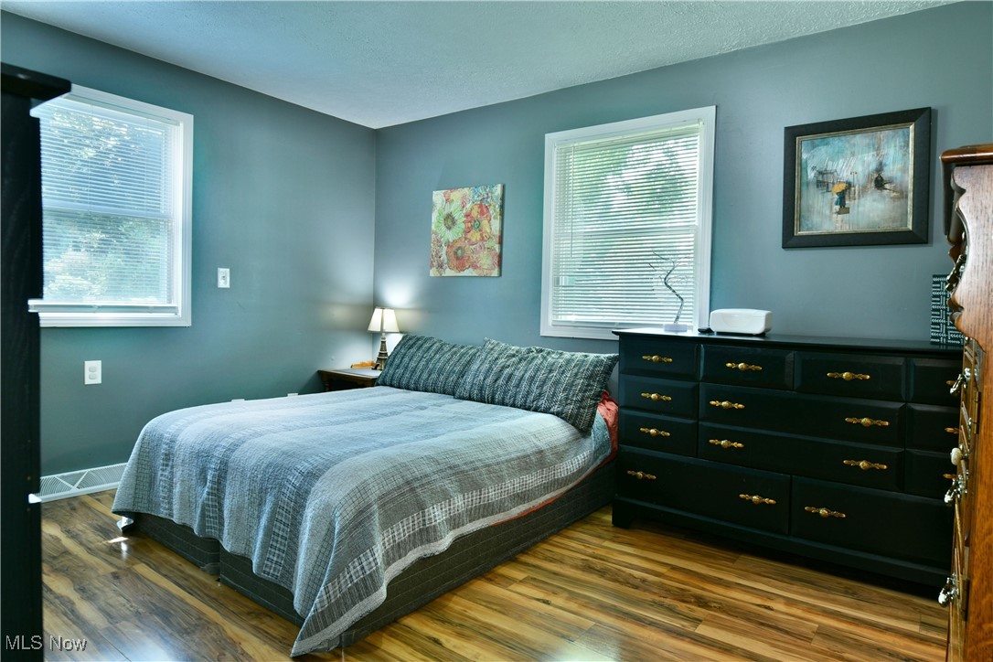 2847 Selkirk Bush Road Warren, OH 44481 - Photo 17 of 47 Bedroom with wood finished floors and baseboards