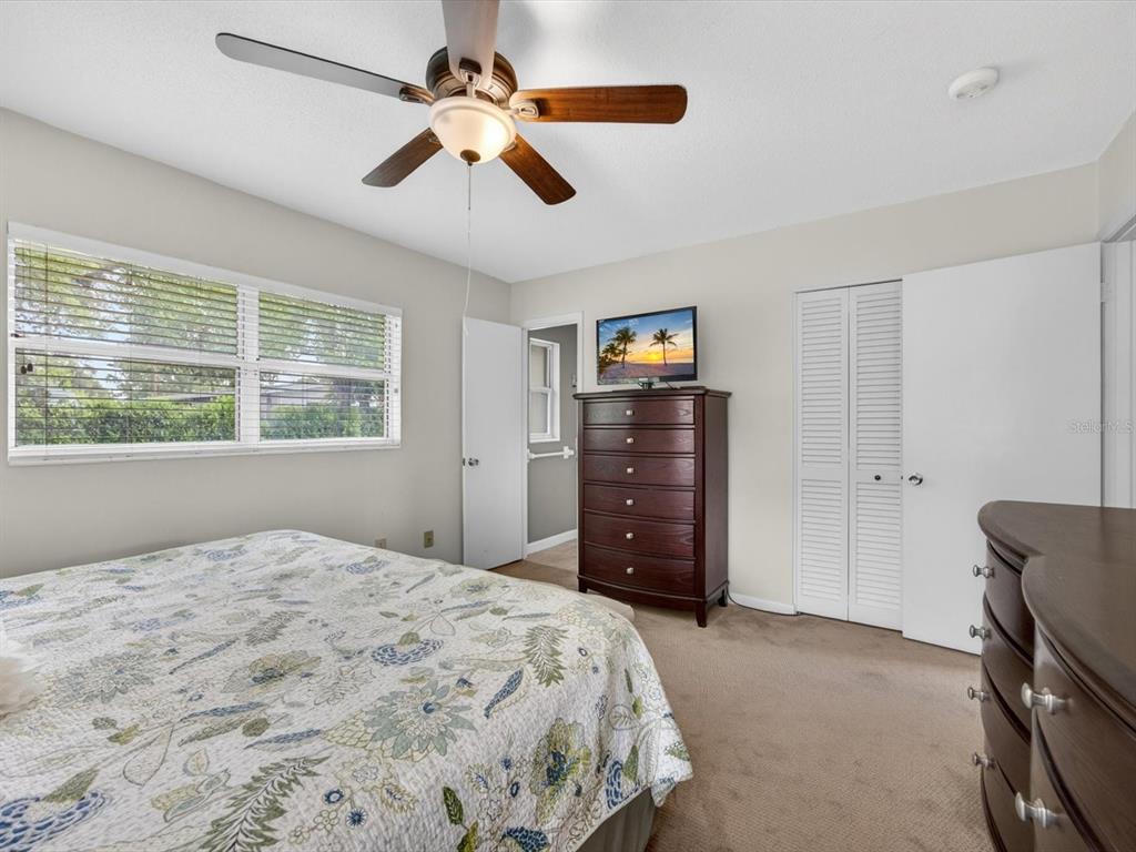2803 Banchory Road Winter Park, FL 32792 - Photo 15 of 31 a bedroom with a bed and a window