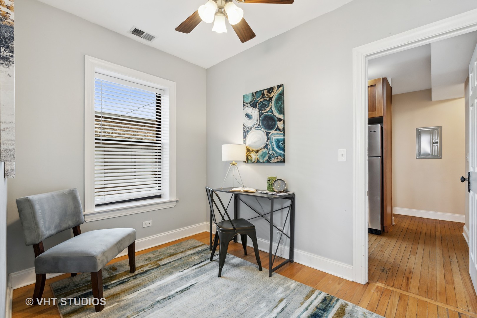 1155 West Grace Street, Unit 2N Chicago, IL 60613 - Photo 12 of 20 a living room with furniture and a wooden floor
