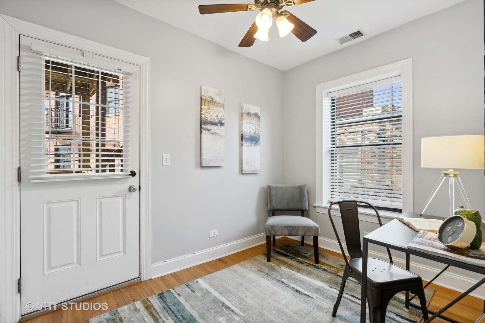 1155 West Grace Street, Unit 2N Chicago, IL 60613 - Photo 13 of 20 a bedroom with furniture and a window