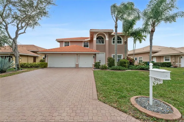 $925,000 | 5053 Northwest 125th Avenue, Coral Springs, FL 33076