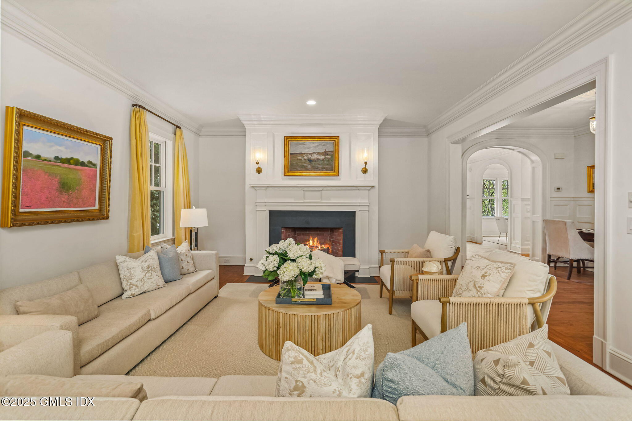10 Francine Drive Greenwich, CT 06830 - Photo 11 of 59 a living room with furniture and a fireplace