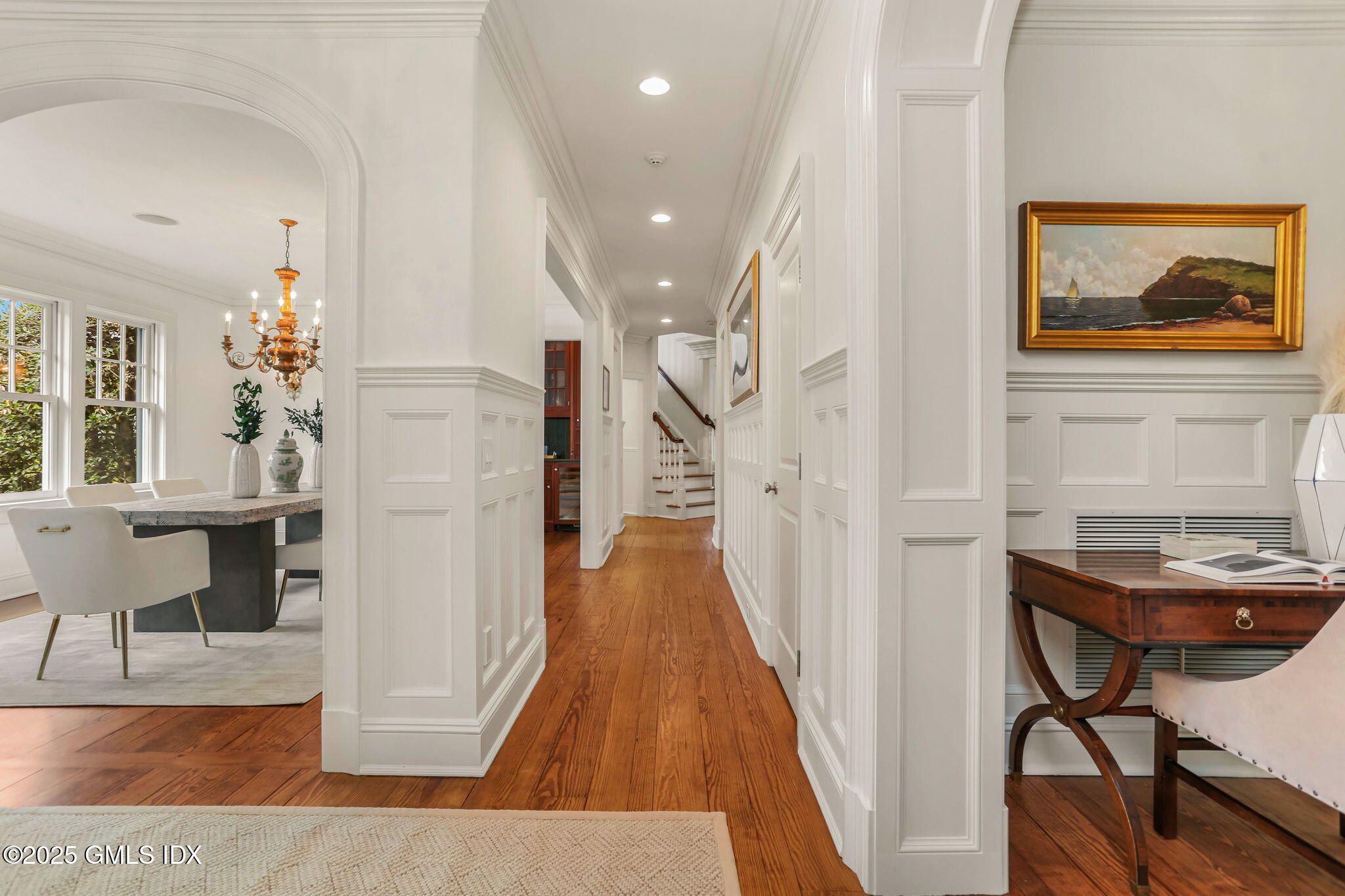 10 Francine Drive Greenwich, CT 06830 - Photo 15 of 59 a view of a hallway with furniture and wooden floor
