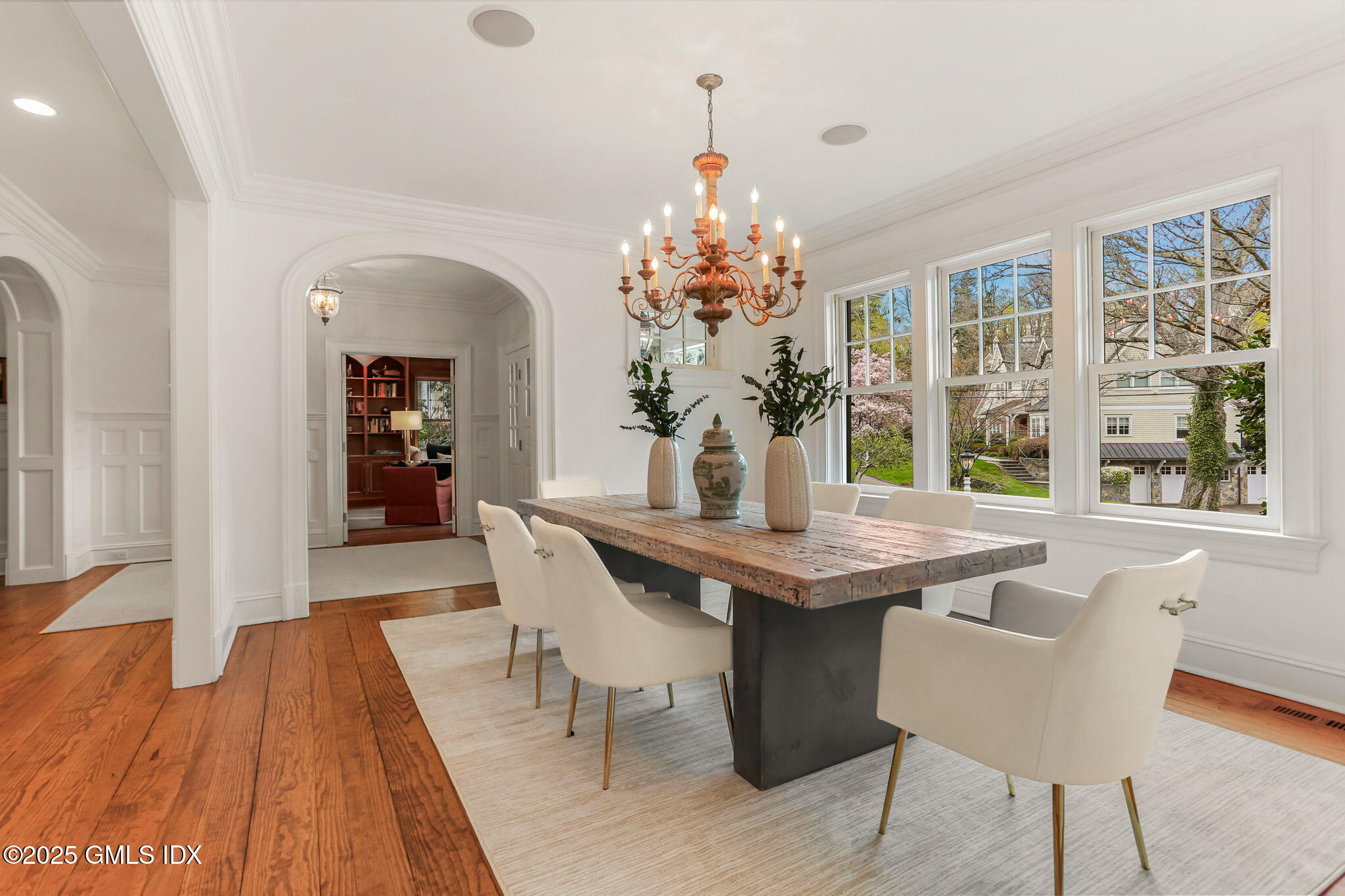 10 Francine Drive Greenwich, CT 06830 - Photo 18 of 59 a dining room with a table and chairs