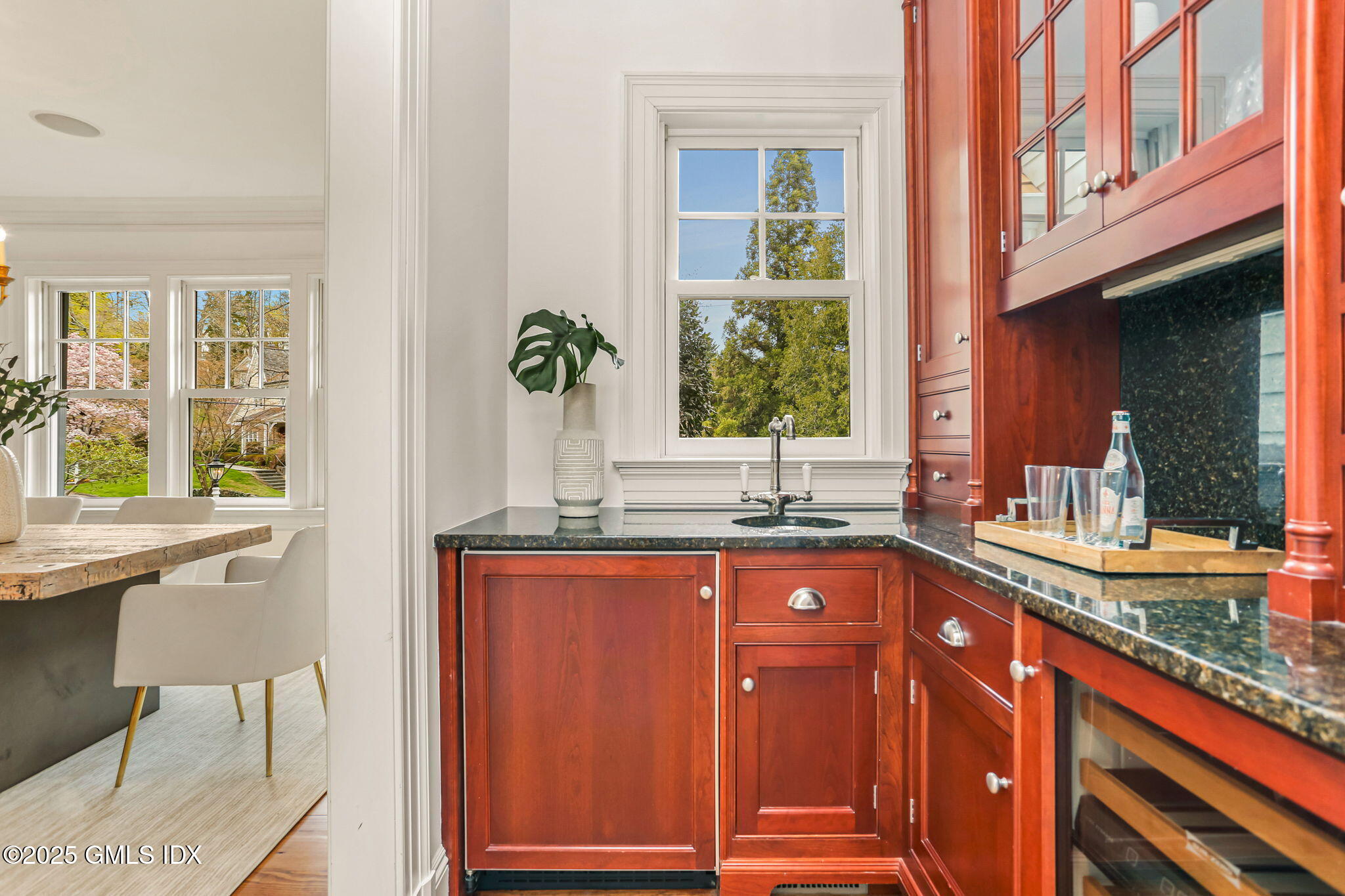 10 Francine Drive Greenwich, CT 06830 - Photo 19 of 59 a kitchen with granite countertop a sink and a window