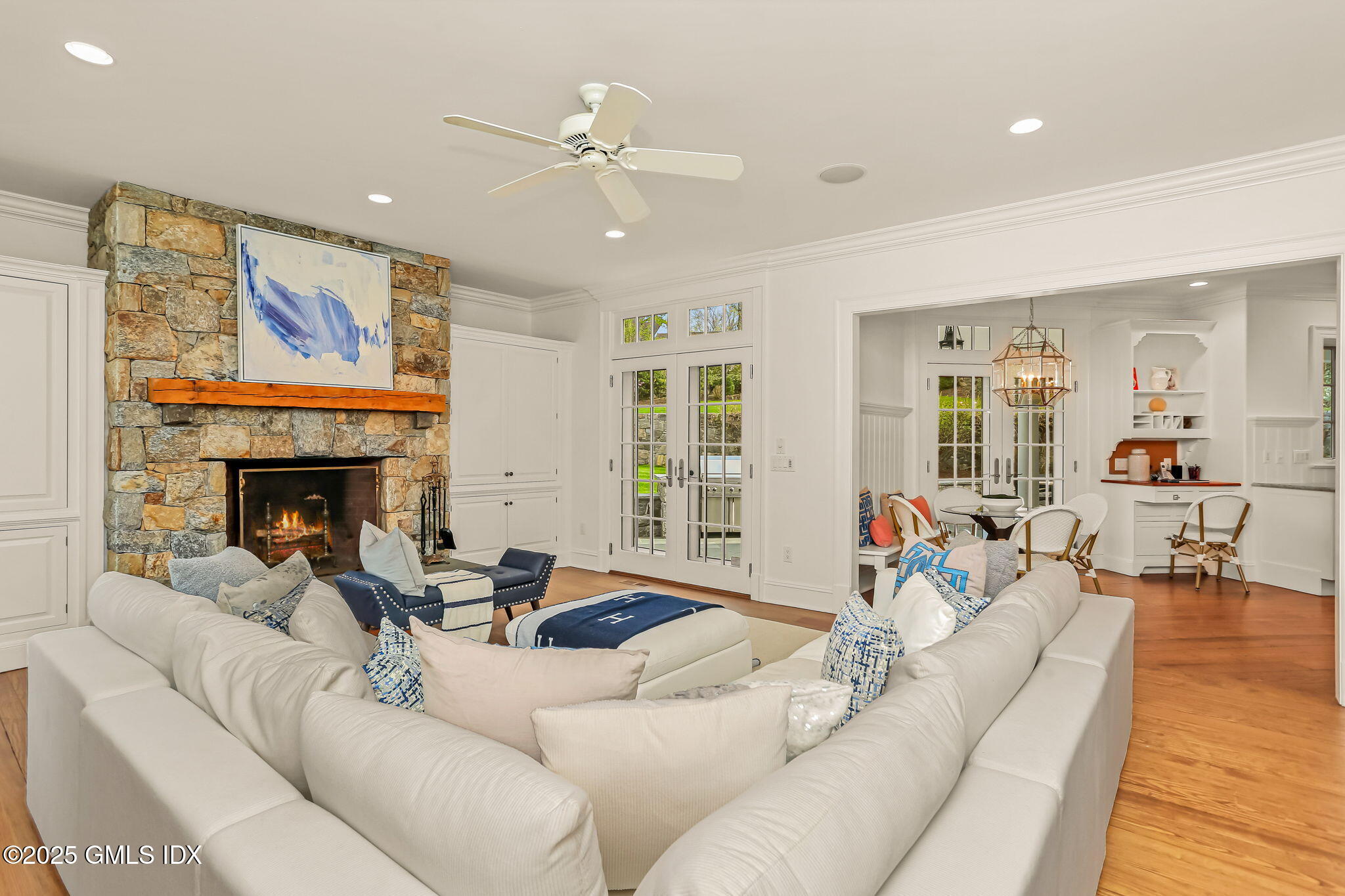 10 Francine Drive Greenwich, CT 06830 - Photo 24 of 59 a living room with furniture and a fireplace