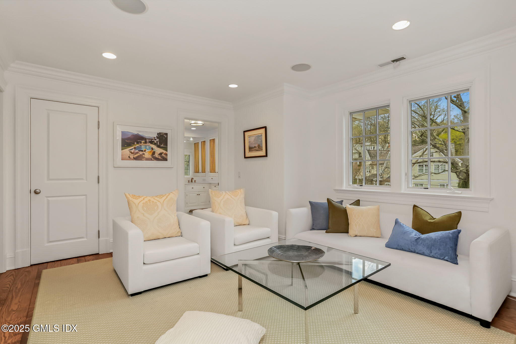 10 Francine Drive Greenwich, CT 06830 - Photo 30 of 59 a living room with furniture and a painting