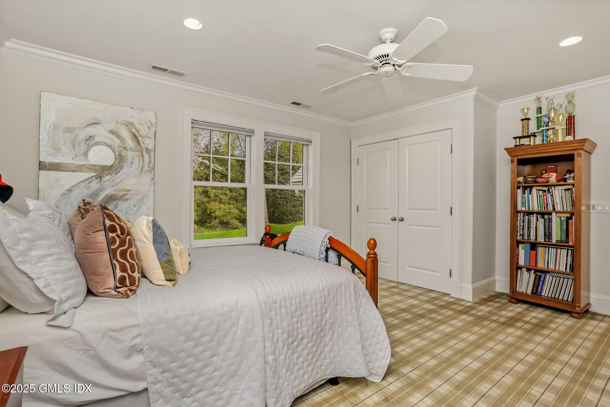 10 Francine Drive Greenwich, CT 06830 - Photo 36 of 59 a bedroom with a bed dresser and a window