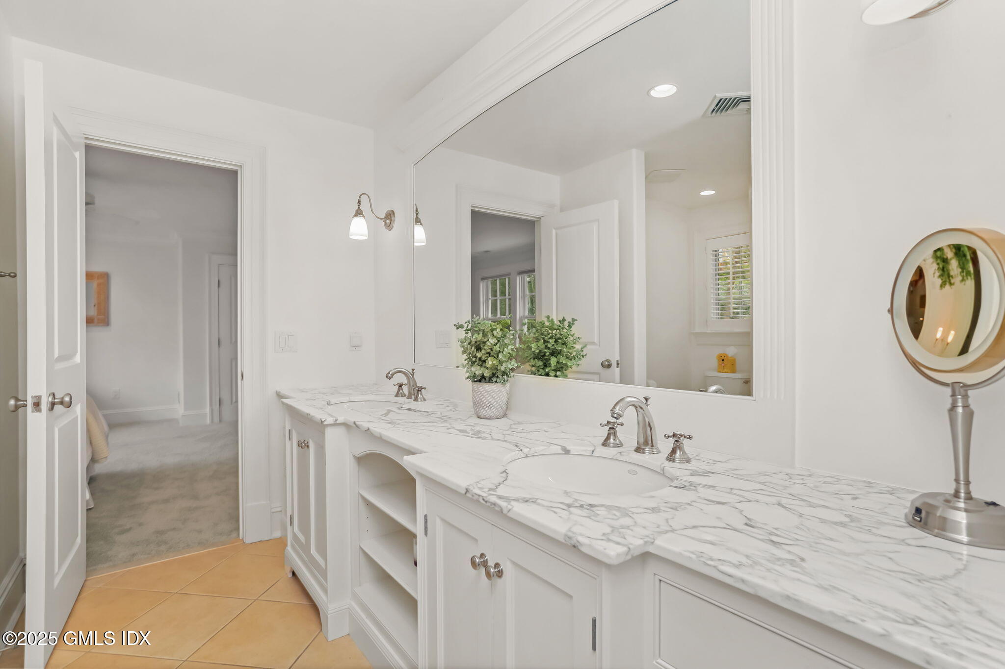 10 Francine Drive Greenwich, CT 06830 - Photo 38 of 59 a bathroom with a sink and a mirror