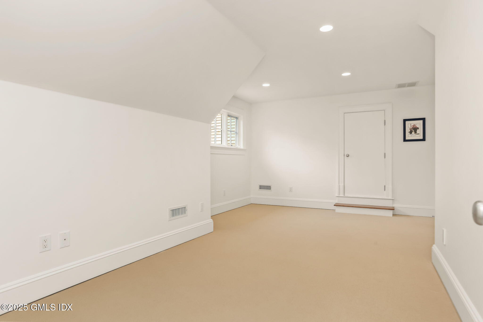 10 Francine Drive Greenwich, CT 06830 - Photo 40 of 59 an empty room with a empty space and windows