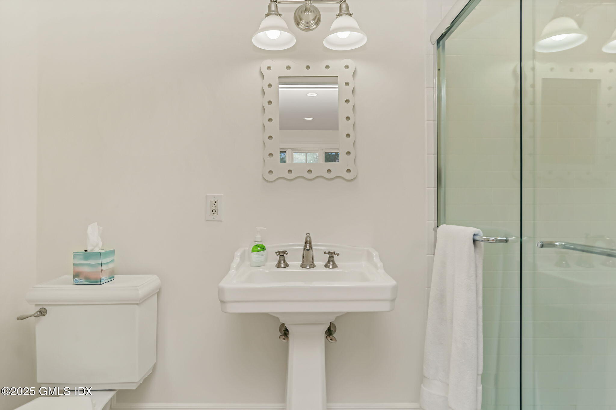 10 Francine Drive Greenwich, CT 06830 - Photo 41 of 59 a bathroom with a sink and a mirror