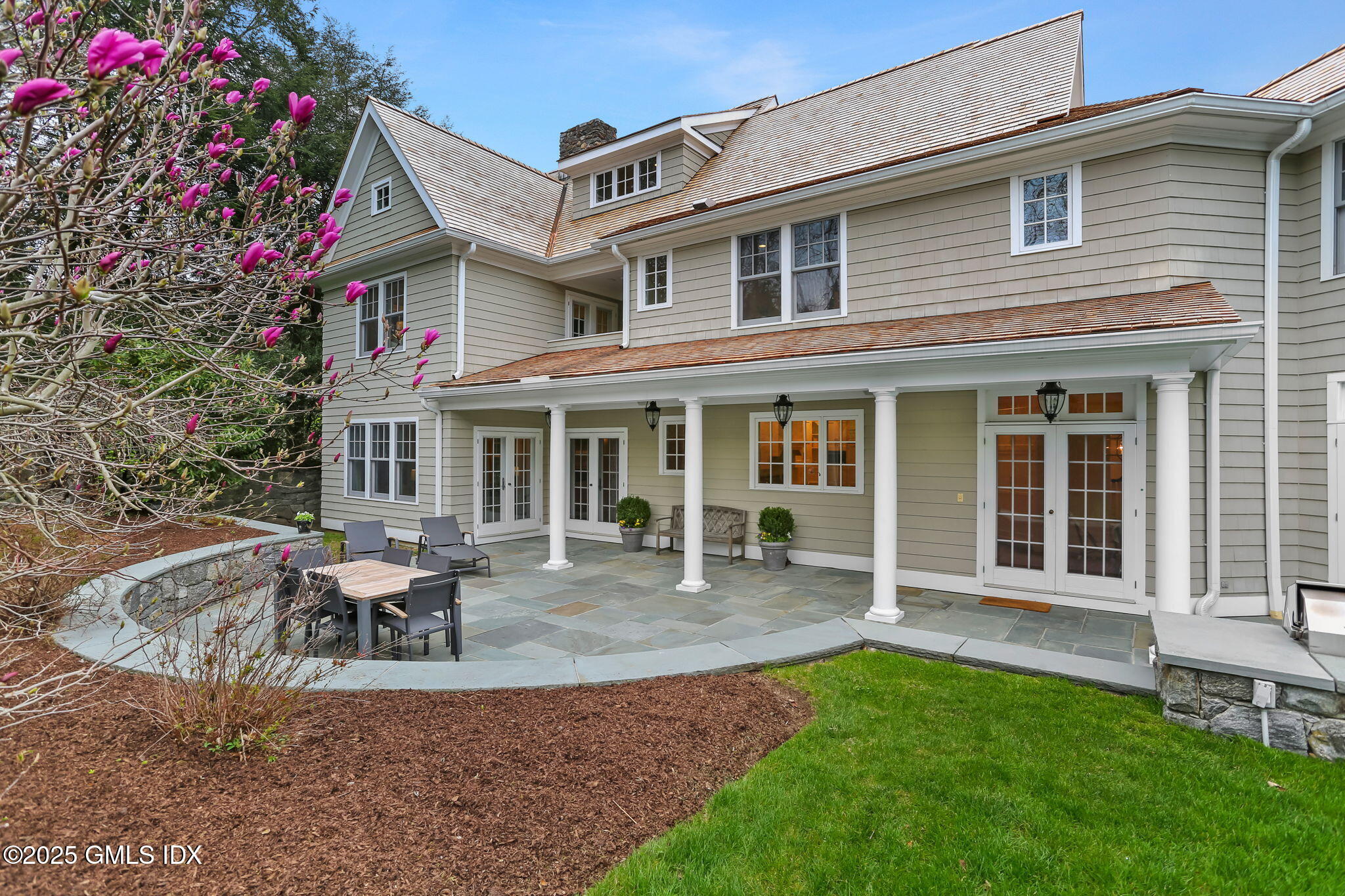 10 Francine Drive Greenwich, CT 06830 - Photo 45 of 59 a view of a house with a yard and sitting area