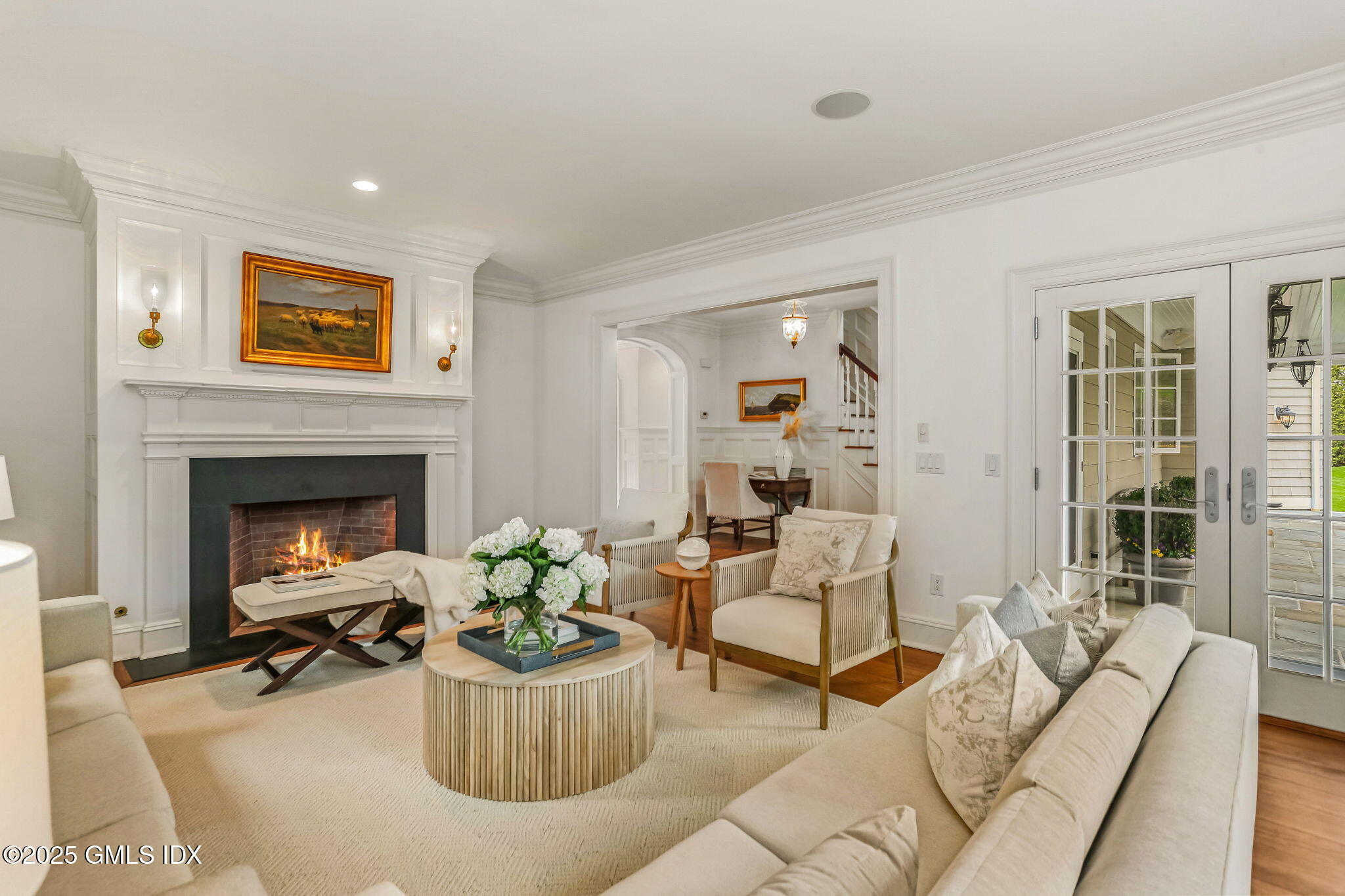 10 Francine Drive Greenwich, CT 06830 - Photo 8 of 59 a living room with furniture and a fireplace