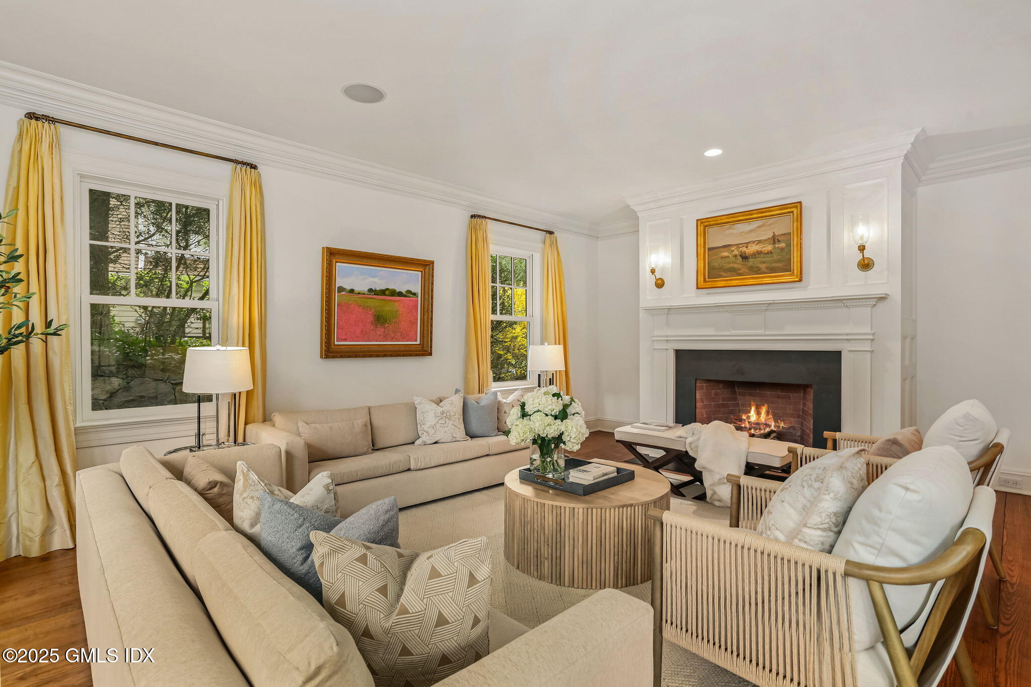10 Francine Drive Greenwich, CT 06830 - Photo 9 of 59 a living room with furniture and a fireplace