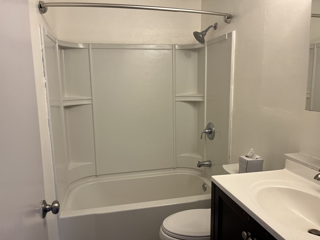176 Maple Avenue, Unit 11 Rutland, MA 01543 - Photo 8 of 10 a bathroom with a sink toilet and shower