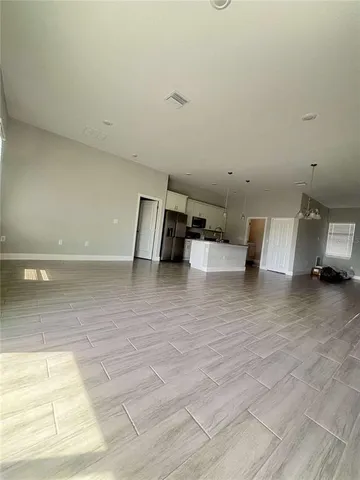 a view of living room and kitchen