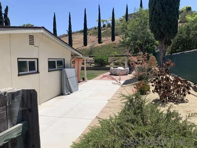 12317 Witt Road Poway, CA 92064 - Photo 12 of 43 a view of a chairs and tables in the patio