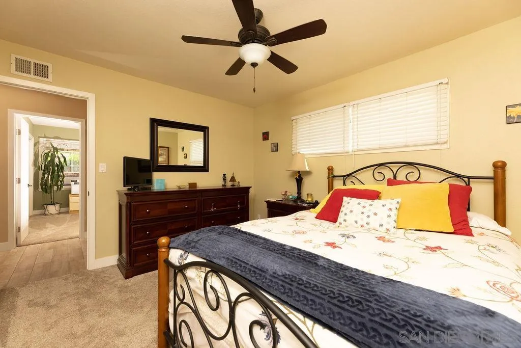 12317 Witt Road Poway, CA 92064 - Photo 29 of 43 a bedroom with a bed and a dresser