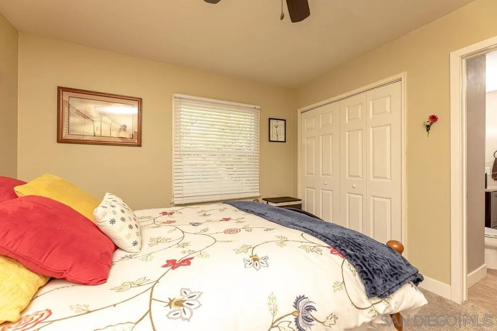 12317 Witt Road Poway, CA 92064 - Photo 30 of 43 a bedroom with a bed and a window
