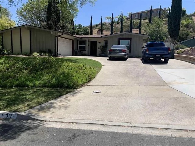 12317 Witt Road Poway, CA 92064 - Photo 6 of 43 a view of a back yard of the house