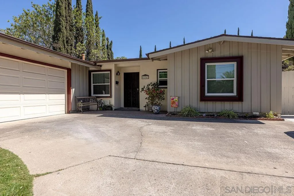 12317 Witt Road Poway, CA 92064 - Photo 7 of 43 a front view of a house with a yard