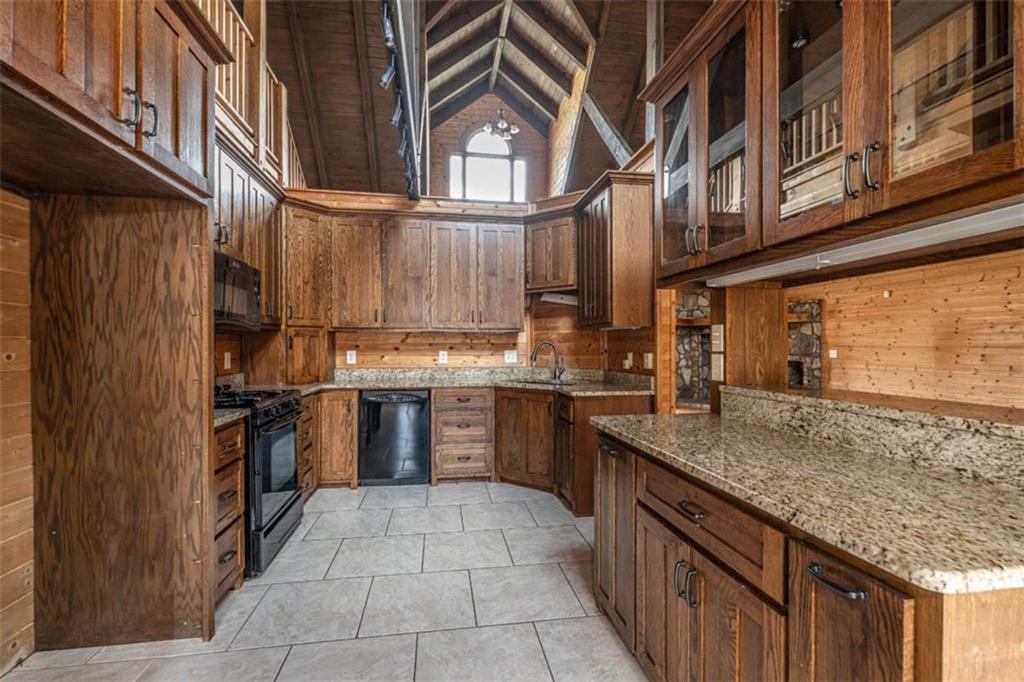 1863 New Rosedale Road Northeast Armuchee, GA 30105 - Photo 14 of 43 a kitchen with a sink and cabinets