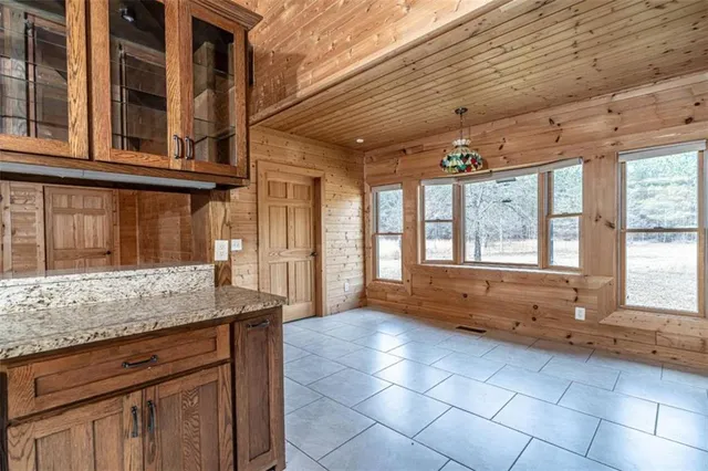 a view of entryway with kitchen