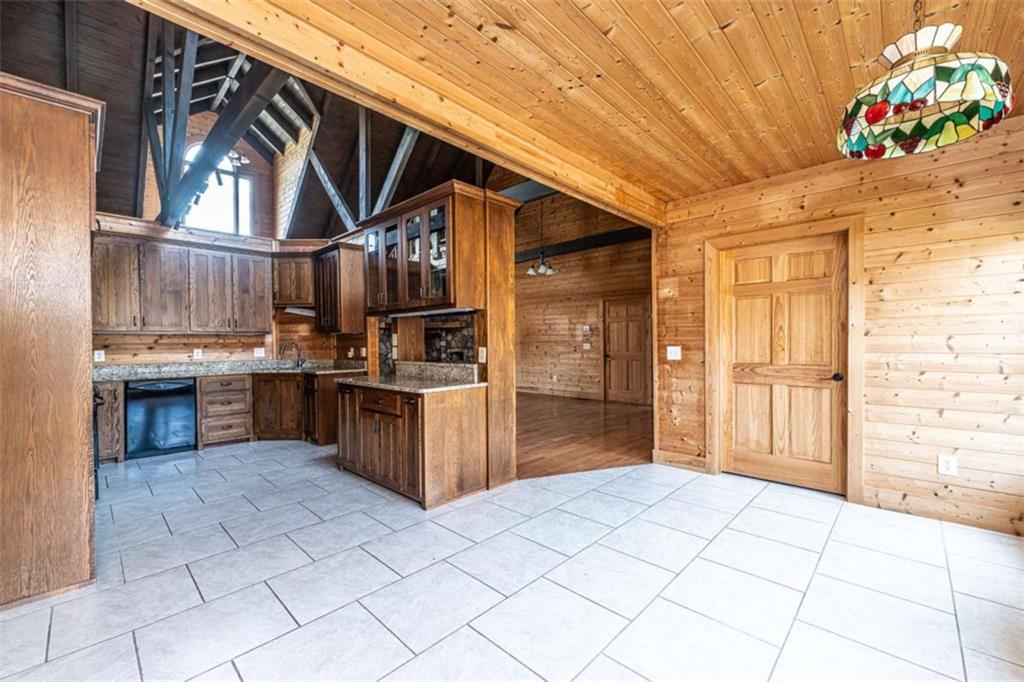 1863 New Rosedale Road Northeast Armuchee, GA 30105 - Photo 16 of 43 a kitchen with stainless steel appliances granite countertop a stove a sink and a refrigerator