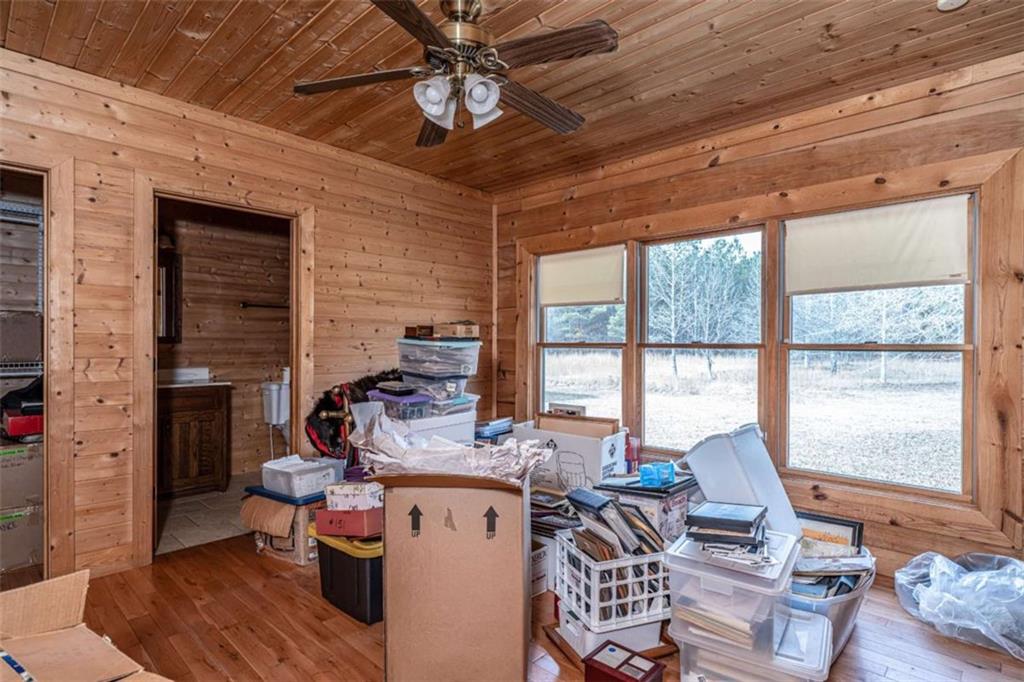 1863 New Rosedale Road Northeast Armuchee, GA 30105 - Photo 27 of 43 a living room with furniture a flat screen tv and a large window
