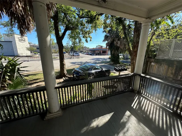a view of a porch with a yard