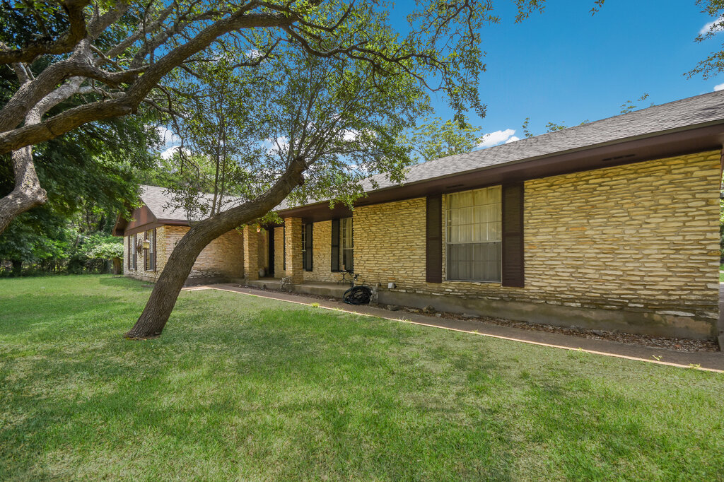 301 Navajo Trail Georgetown, TX 78633 - Photo 2 of 35 a view of a house with a backyard
