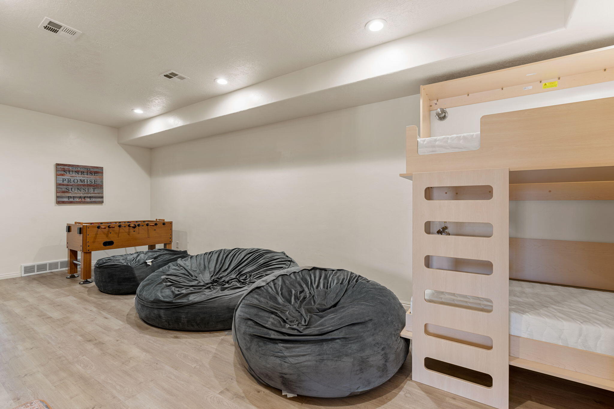327 Aoki Michi Brian Head, UT 84719 - Photo 36 of 87 Basement Family Room with fold out Murphy Beds