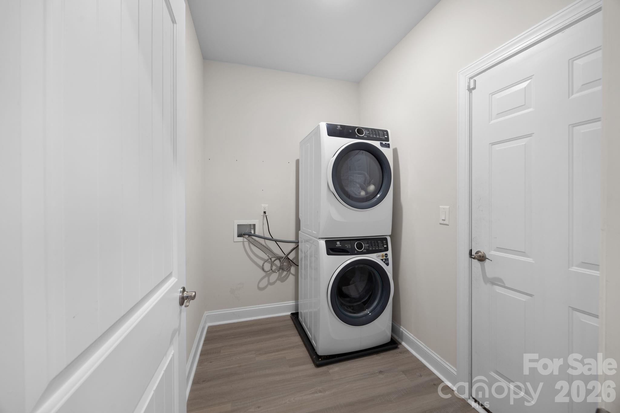 181 Brixham Loop Troutman, NC 28166 - Photo 20 of 28 a utility room with dryer and washer
