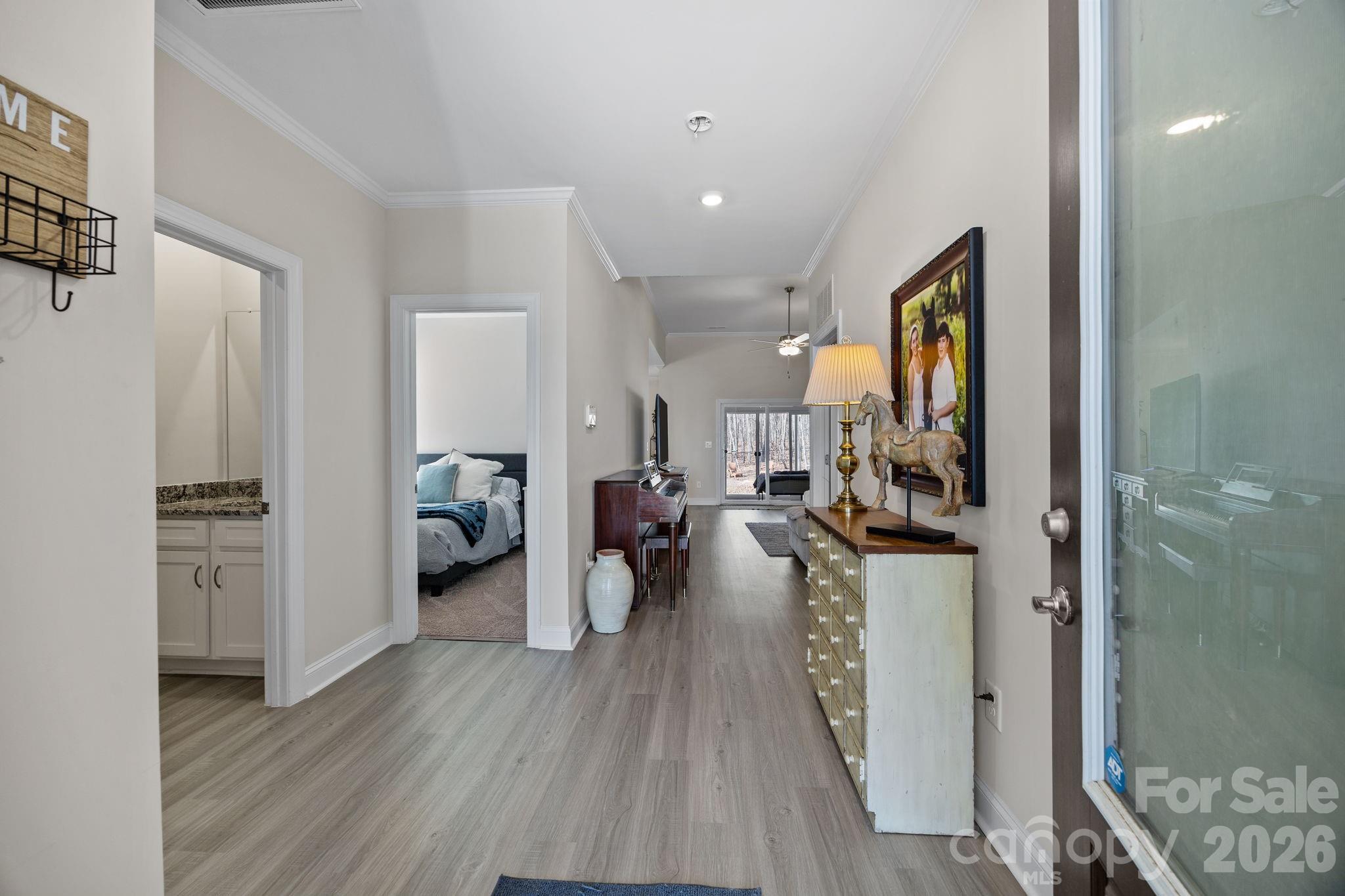 181 Brixham Loop Troutman, NC 28166 - Photo 3 of 28 a view of a living room and dining room