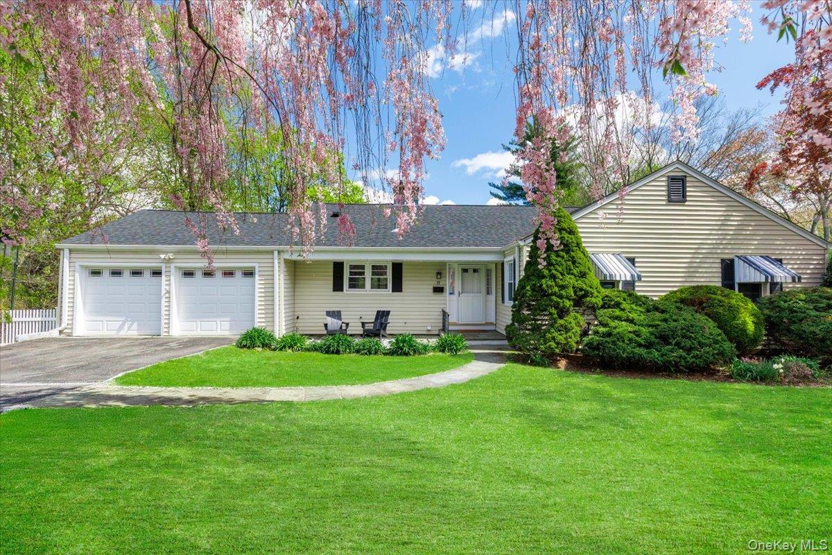Welcome to 17 Rock Ridge Drive set on a quiet cul de sac in the Blind Brook School District
