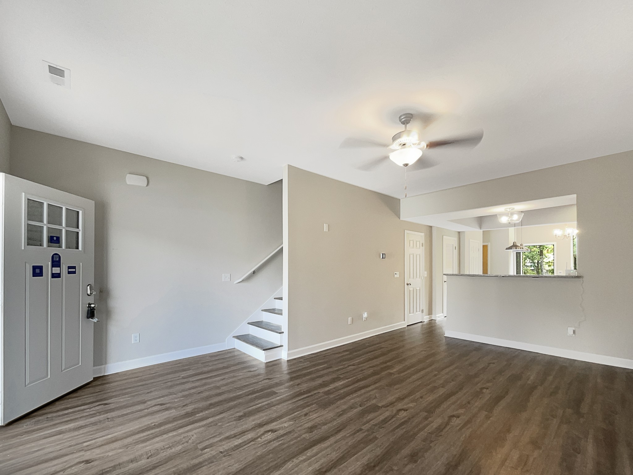 1382 Rural Hill Road, Unit 364 Antioch, TN 37013 - Photo 3 of 22 an empty room with wooden floor and ceiling fan