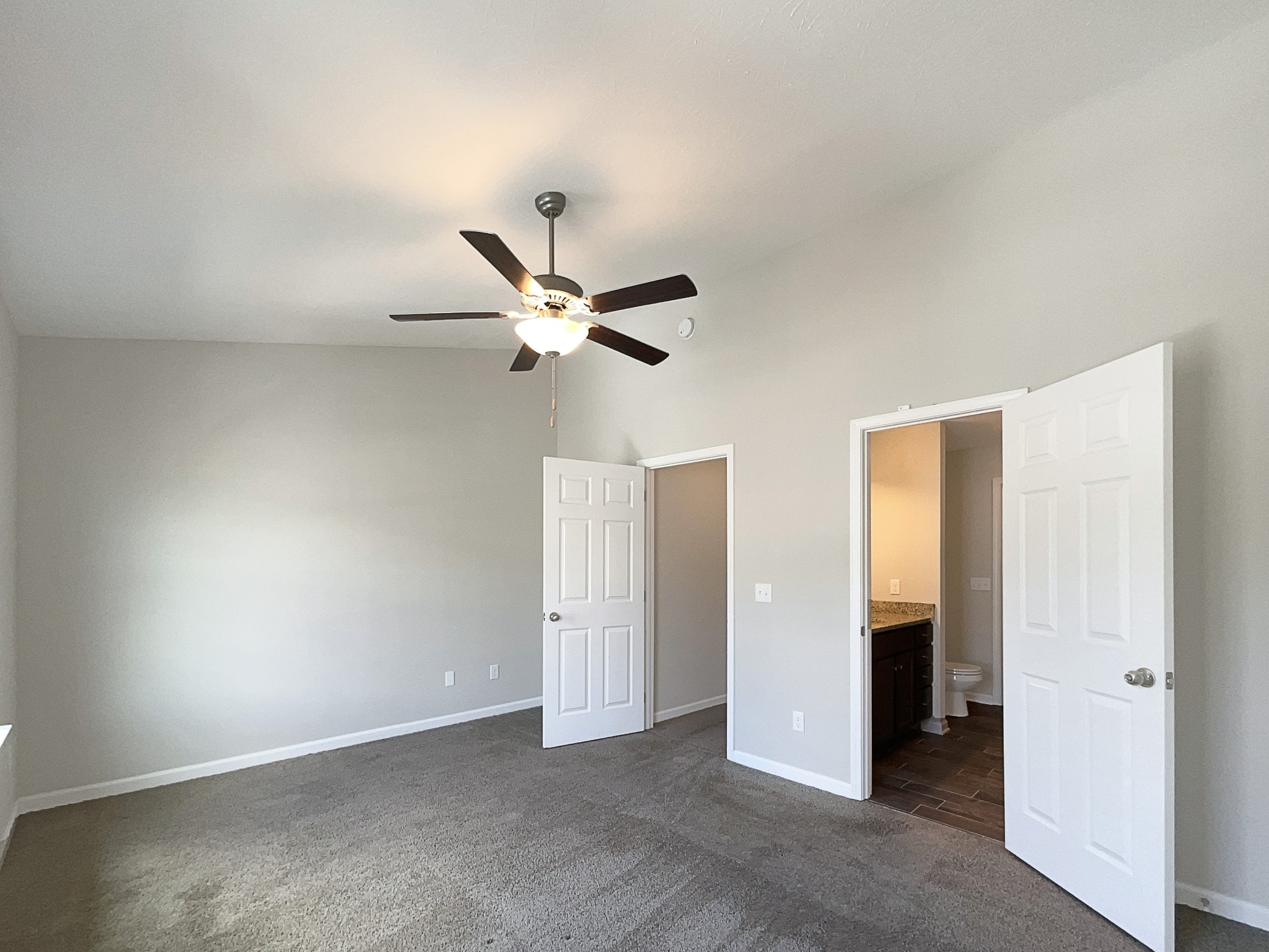 1382 Rural Hill Road, Unit 364 Antioch, TN 37013 - Photo 9 of 22 a view of a room with closet and chandelier fan