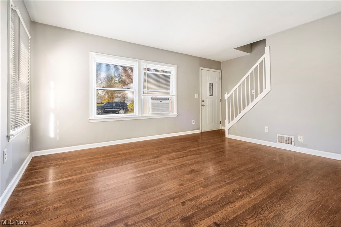 1612 Garman Road Akron, OH 44313 - Photo 5 of 18 Spare room with dark hardwood / wood-style flooring