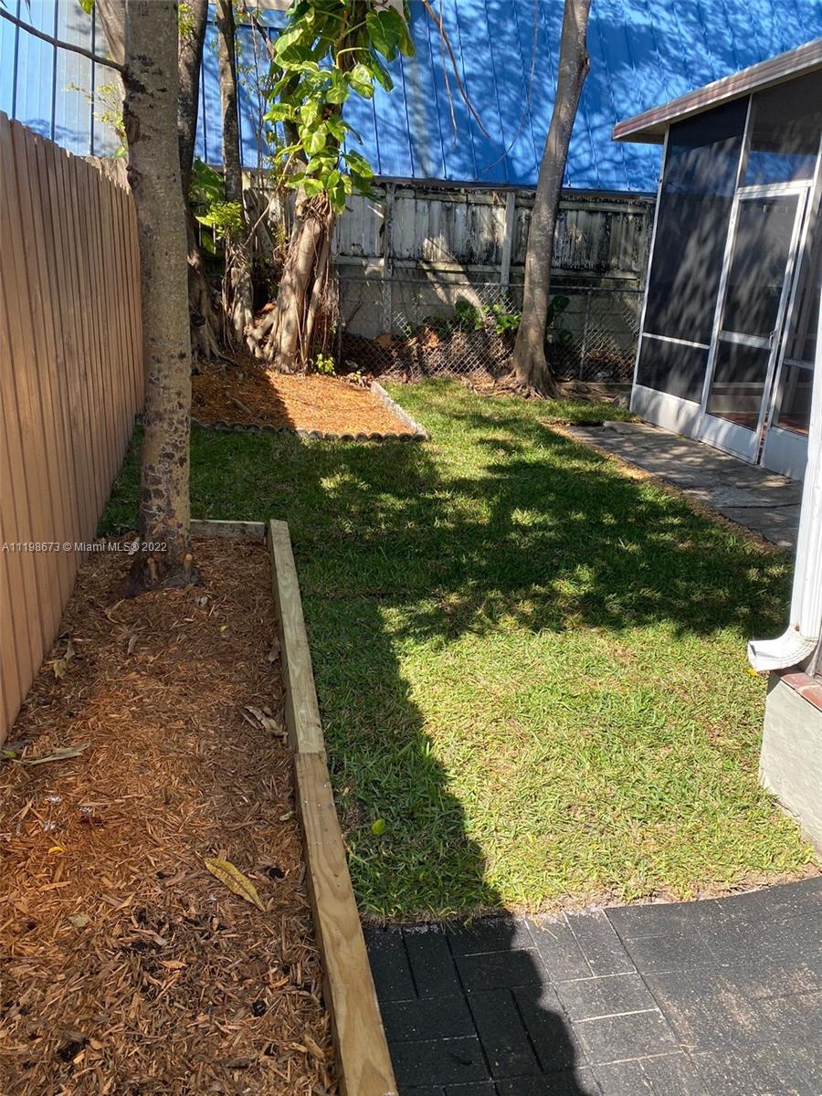 West Flagler Miami, FL 33126 - Photo 21 of 21 a view of a backyard with pathway