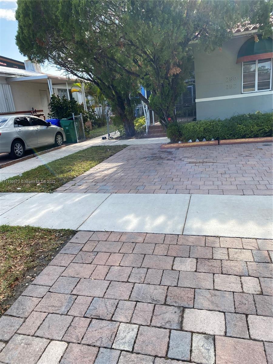 West Flagler Miami, FL 33126 - Photo 8 of 21 a view of a yard and a car