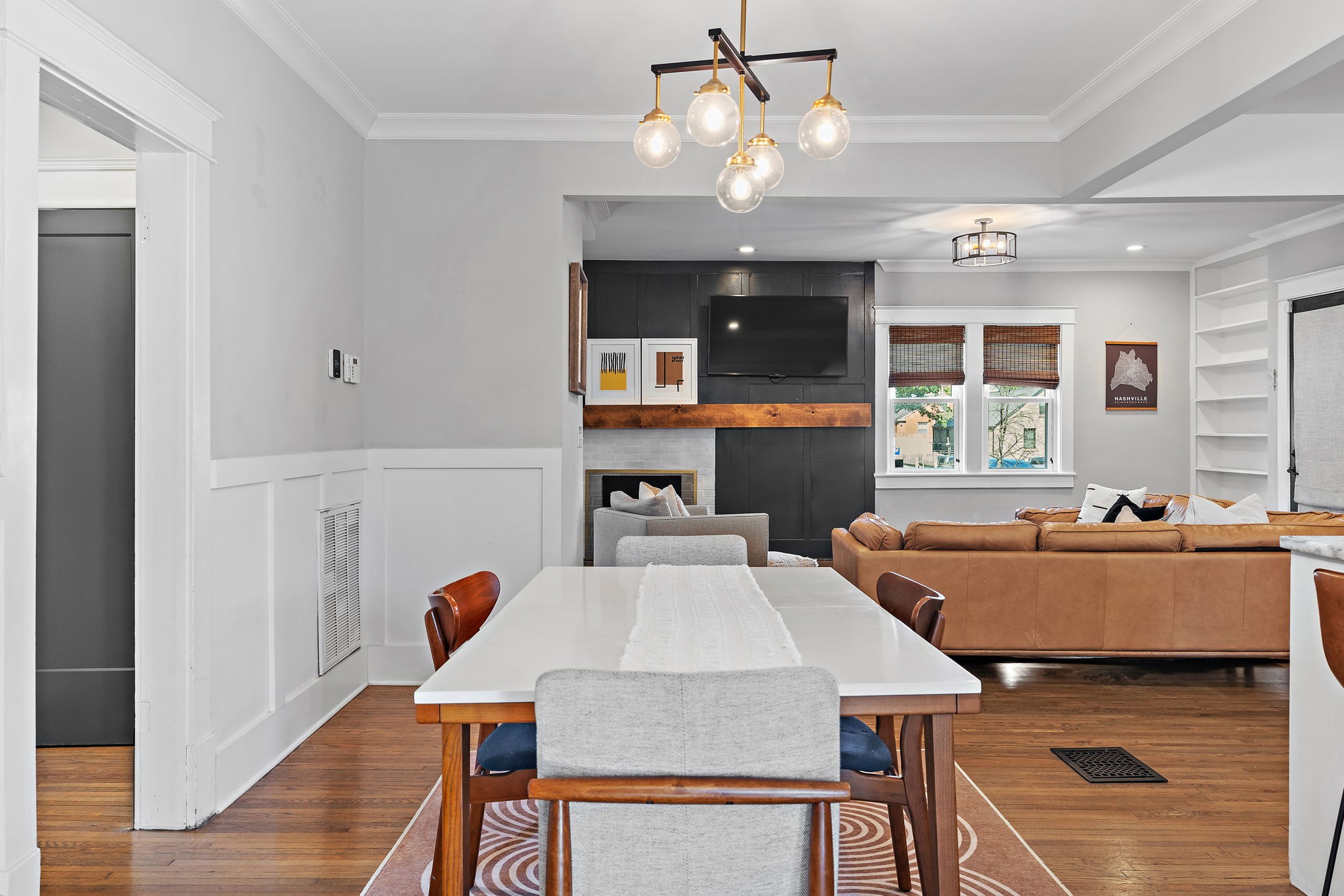 1058 Gwynn Drive Nashville, TN 37216 - Photo 15 of 36 a view of a dining room with furniture window and wooden floor