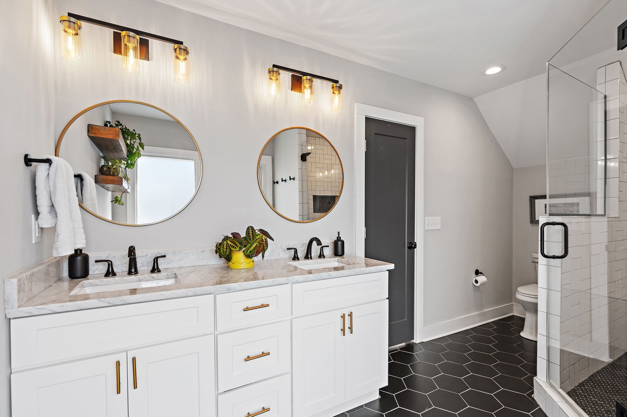 1058 Gwynn Drive Nashville, TN 37216 - Photo 19 of 36 a bathroom with a double vanity sink mirror and toilet