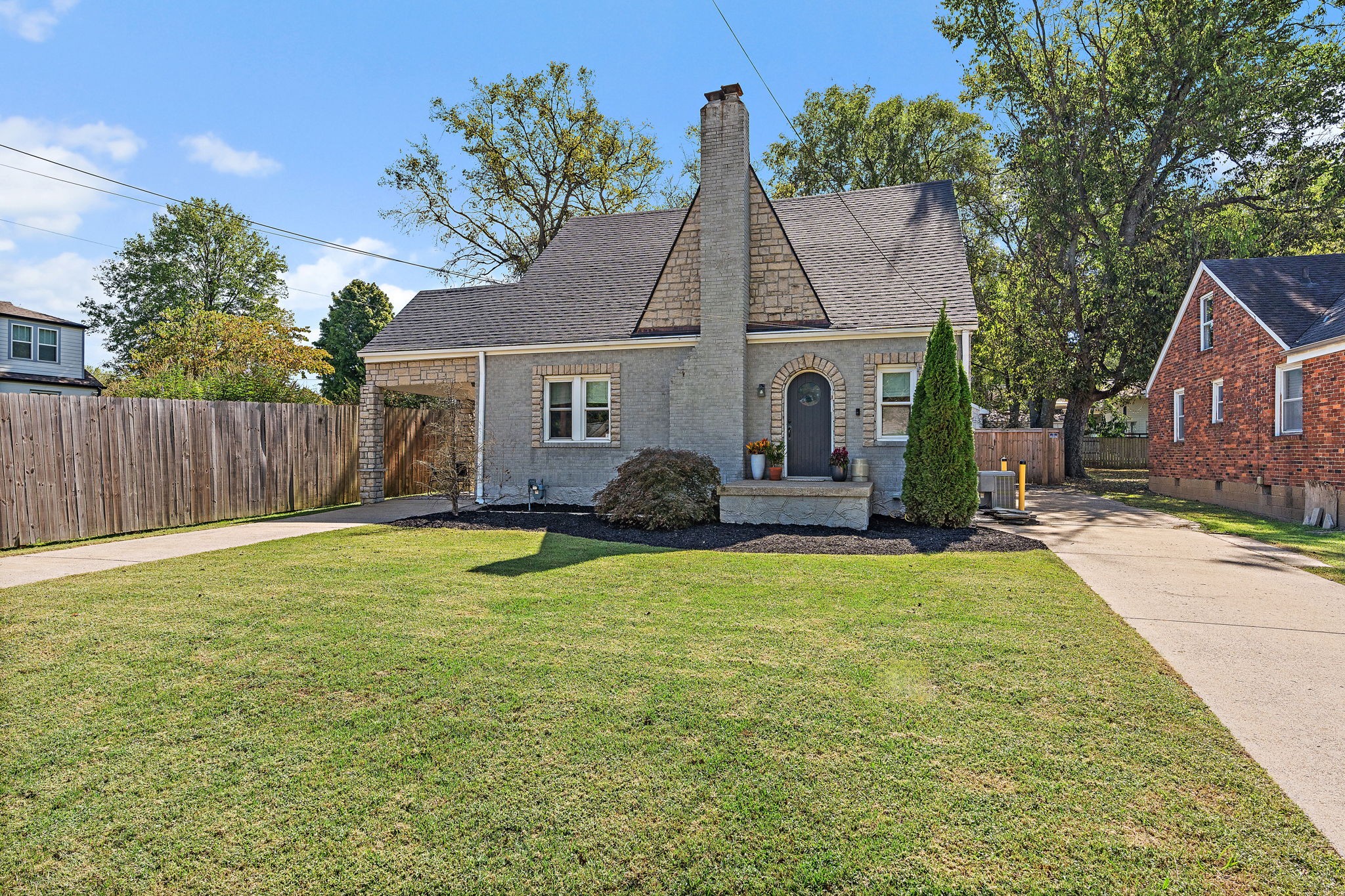1058 Gwynn Drive Nashville, TN 37216 - Photo 2 of 36 a view of a house with backyard and a tree
