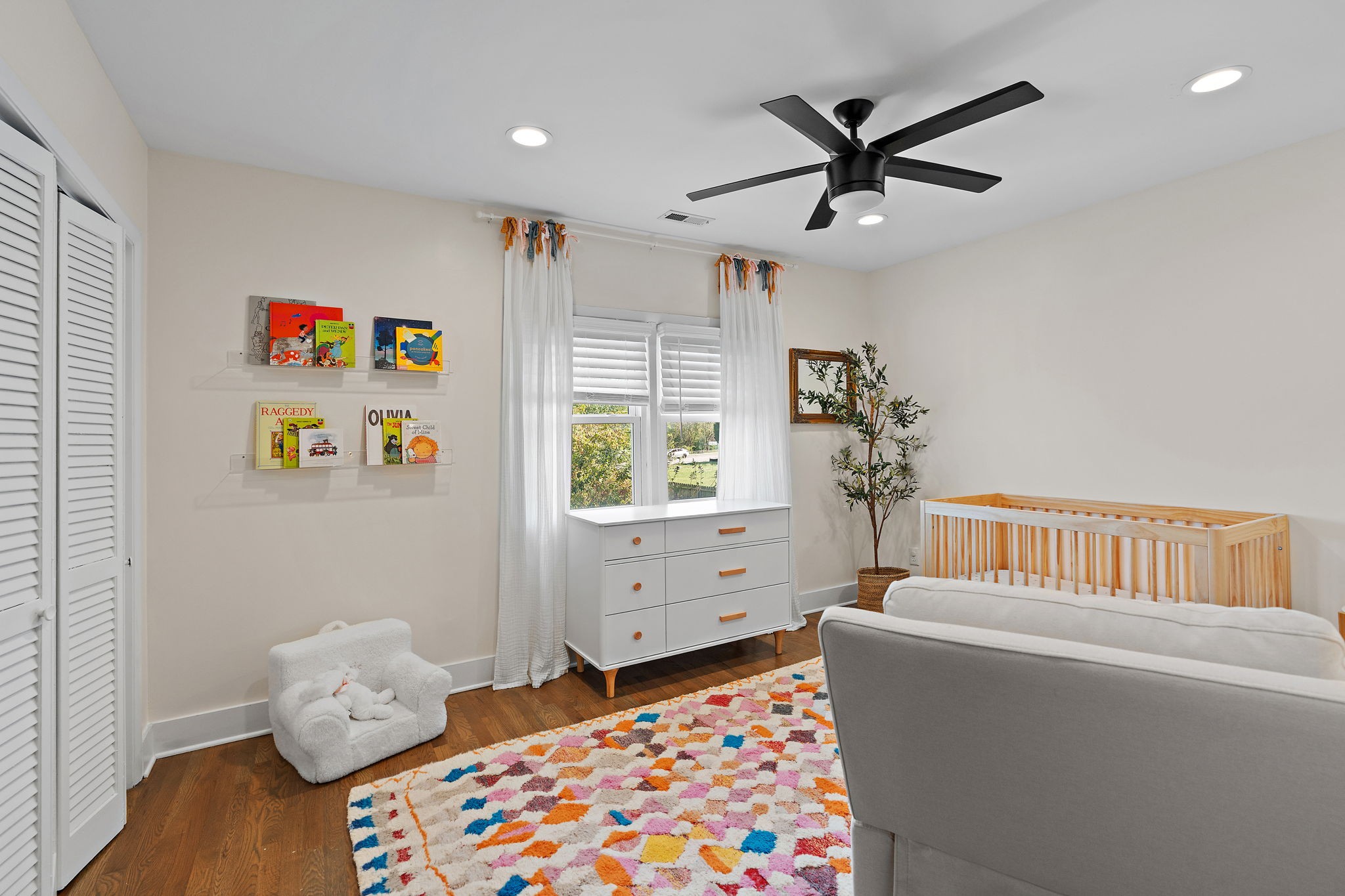 1058 Gwynn Drive Nashville, TN 37216 - Photo 22 of 36 a bedroom with furniture and a window
