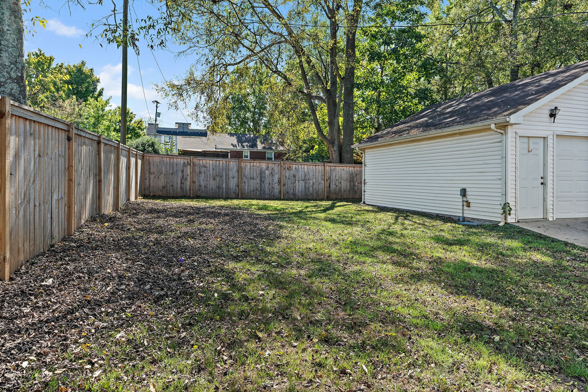 1058 Gwynn Drive Nashville, TN 37216 - Photo 30 of 36 a view of small yard with wooden fence