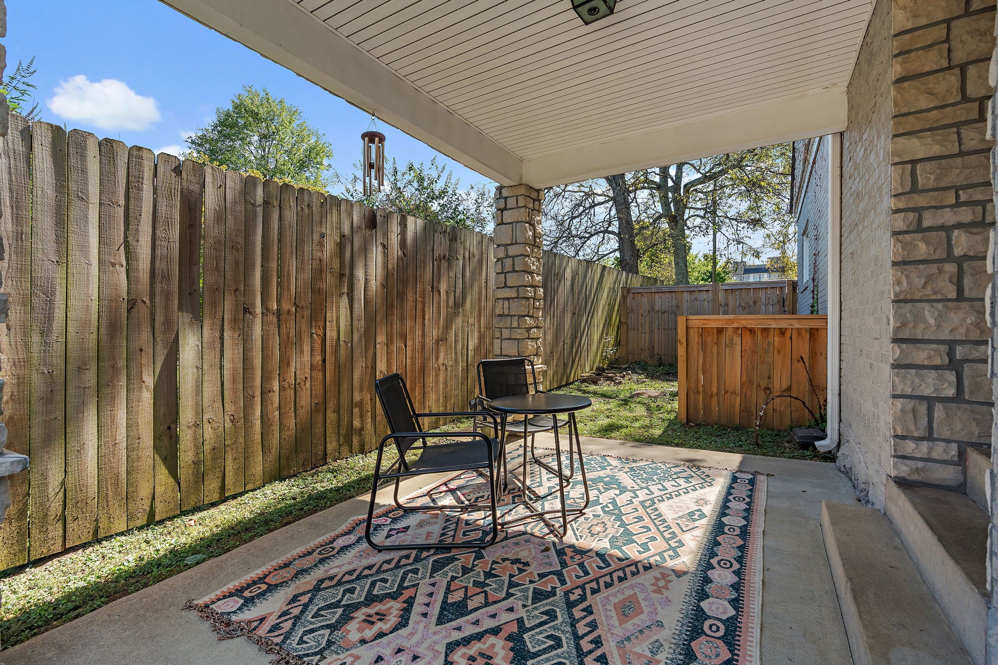 1058 Gwynn Drive Nashville, TN 37216 - Photo 3 of 36 a view of a chairs and table in backyard of the house